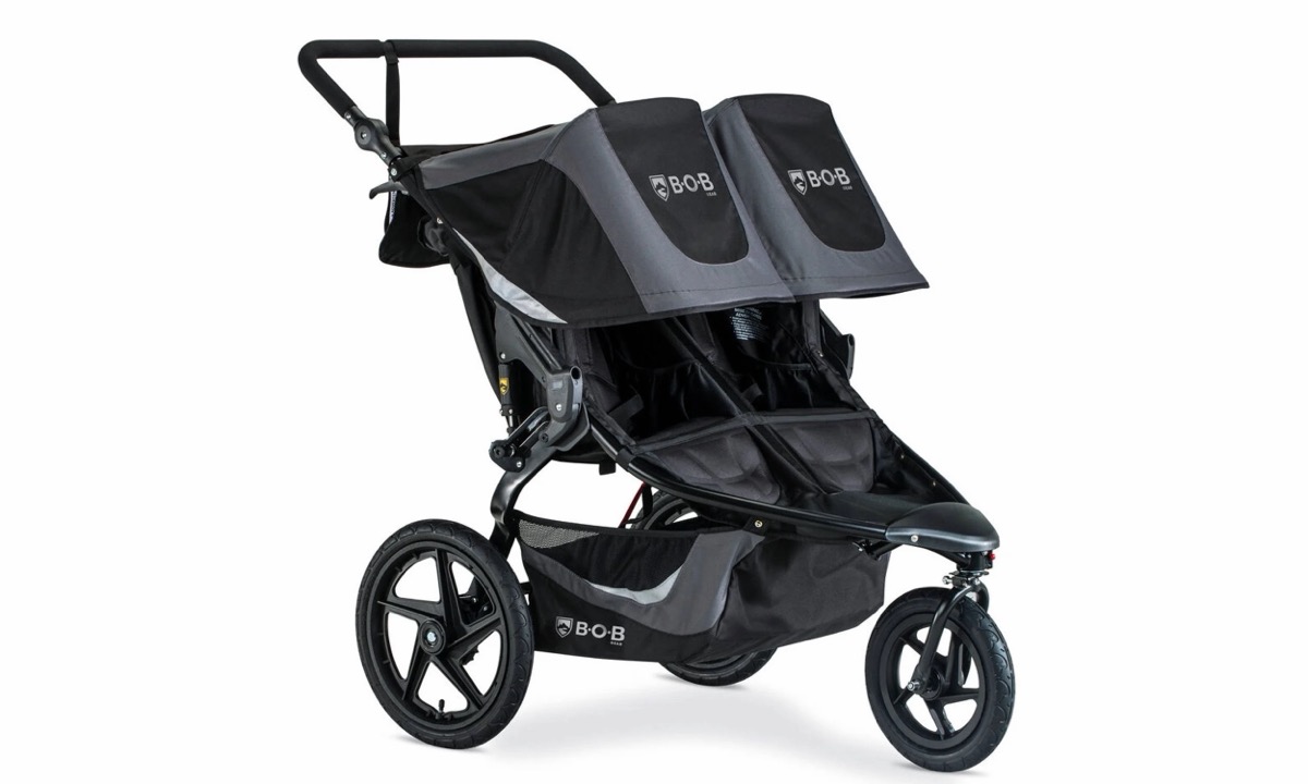 Revolution Flex 3.0 Duallie in Graphite Black, right-side view showing the two side-by-side seats
