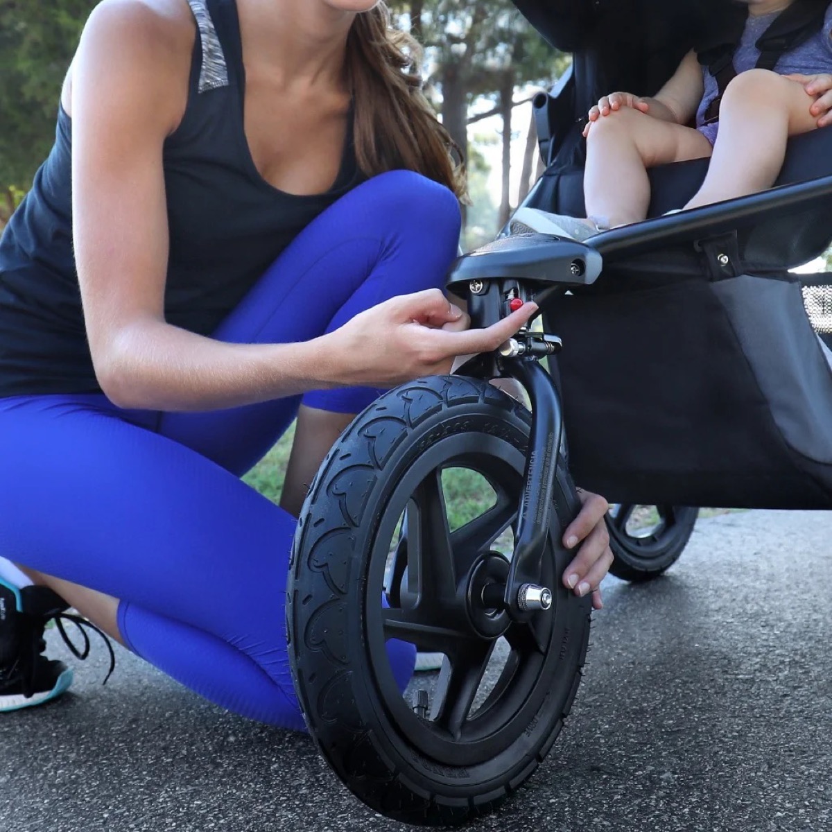 BOB Gear Revolution Flex 3.0 single jogging stroller in full profile as published on the manufacturer product page, Graphite Black colorway