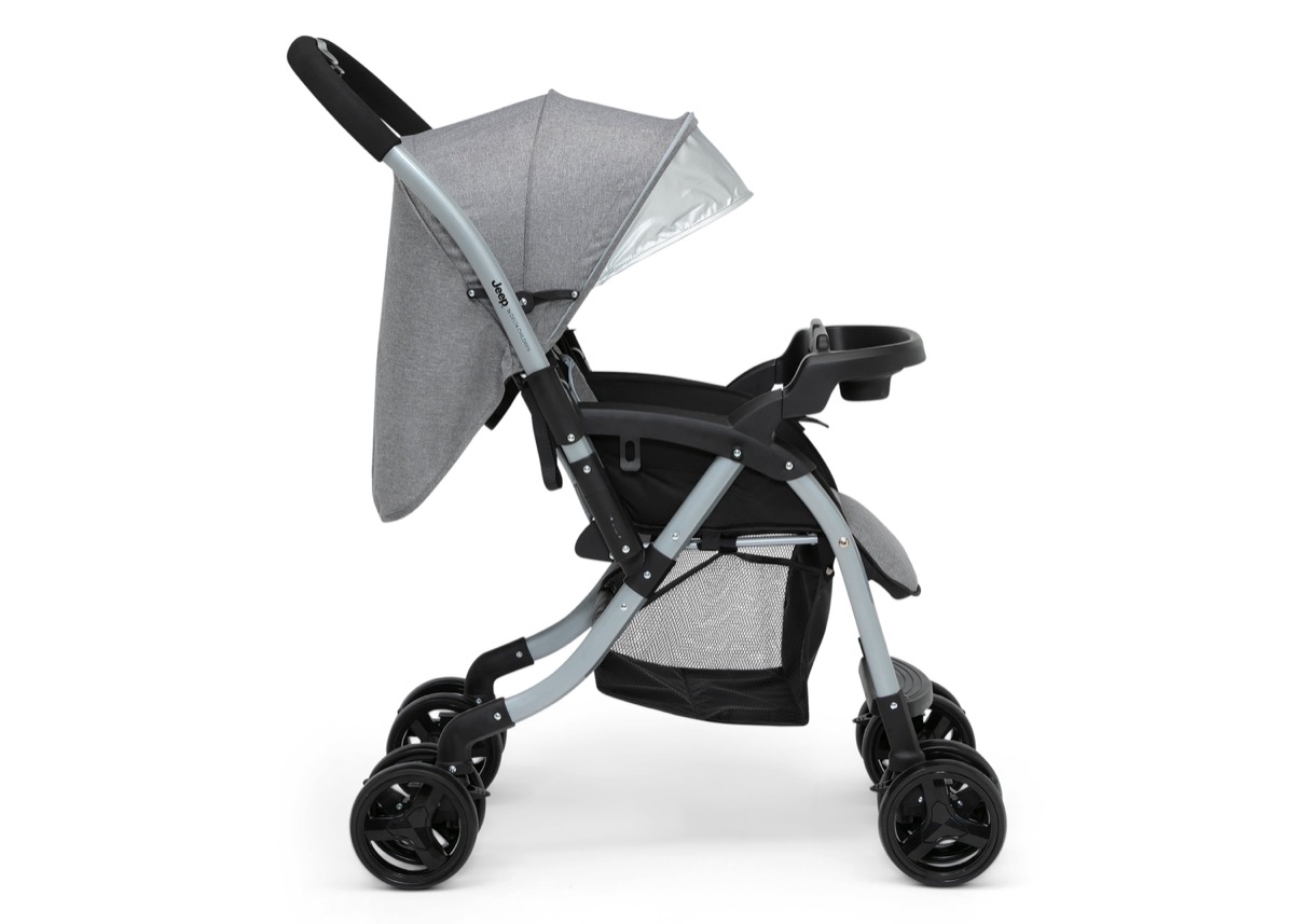 Official Delta Children product-page studio photo of the Jeep Unlimited Reversible Handle Stroller in the Grey Tweed colorway from an alternate angle