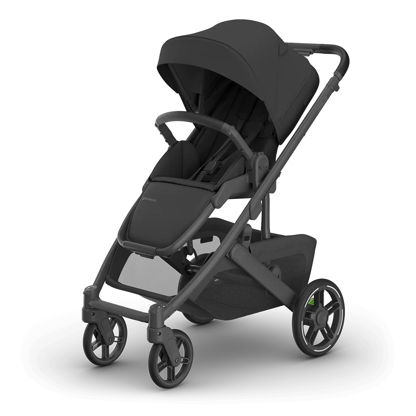 Official UPPAbaby studio render of the Cruz V3 in Jake (charcoal fabric, carbon frame, black leather), seen from the rear left with the extended canopy, mesh side panels and under-seat basket visible on a white background