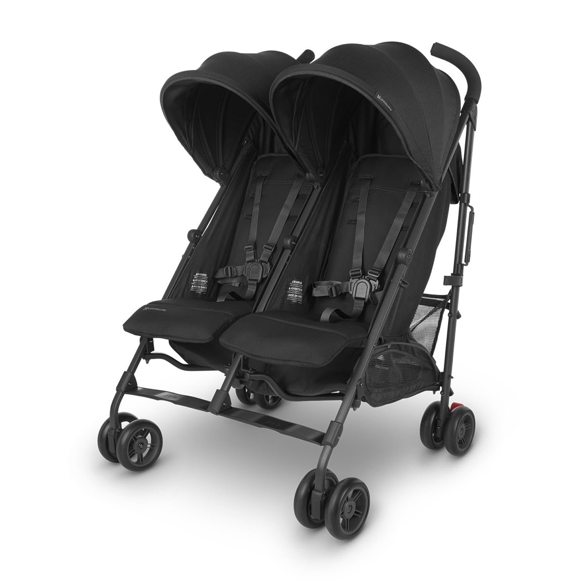 UPPAbaby G-Link V2 double stroller in Jake (Black/Carbon Frame) from the Amazon listing, front three-quarter view showing two reclining seats and both canopies