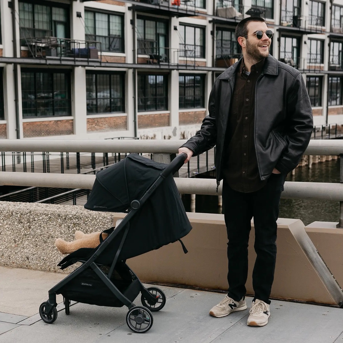 UPPAbaby Minu V3 stroller in James shown in a lifestyle setting — manufacturer lifestyle gallery view